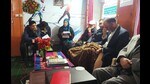 A writer reads out her short fiction at a meeting of the Kashmir Fiction Writers Guild. (Hilal Mir)