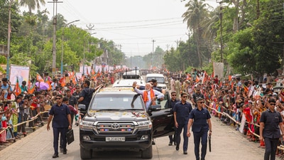 Prime Minister Narendra Modi during his roadshow in Barasat, West Bengal. (PTI) Prime Minister Narendra Modi during his roadshow in Barasat, West Bengal. (PTI)