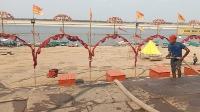 A man cleaning the stairs at a ghat before daily ‘aarti’ on the bank of the Ganga, said to be the lifeline of Varanasi. (Gaurav Saigal/HT Photo) A man cleaning the stairs at a ghat before daily ‘aarti’ on the bank of the Ganga, said to be the lifeline of Varanasi. (Gaurav Saigal/HT Photo)