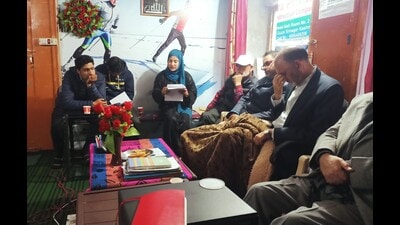 A writer reads out her short fiction at a meeting of the Kashmir Fiction Writers Guild. (Hilal Mir) A writer reads out her short fiction at a meeting of the Kashmir Fiction Writers Guild. (Hilal Mir)