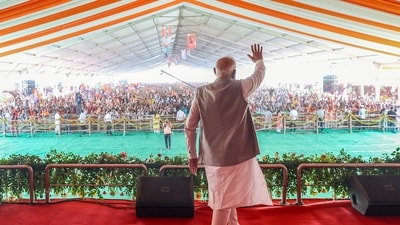 Prime Minister Narendra Modi waves to the crowd during the public meeting ahead of the seventh phase of Lok Sabha Polls. (ANI) Prime Minister Narendra Modi waves to the crowd during the public meeting ahead of the seventh phase of Lok Sabha Polls. (ANI)