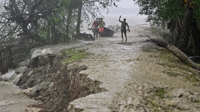 'Remal' weakened into a cyclonic storm on Monday morning, sustaining wind speeds of 80-90 kilometres per hour, following landfall around midnight of Sunday, the Met Department said. (AFP) 'Remal' weakened into a cyclonic storm on Monday morning, sustaining wind speeds of 80-90 kilometres per hour, following landfall around midnight of Sunday, the Met Department said. (AFP)