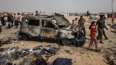 Damage at the site of an Israeli strike on an area designated for displaced people in Rafah, southern Gaza Strip. (Bloomberg) Damage at the site of an Israeli strike on an area designated for displaced people in Rafah, southern Gaza Strip. (Bloomberg)