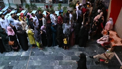 Voters queue up to cast their ballots at a polling station during the sixth phase of voting in India's general election in New Delhi on May 25, 2024. India is voting in seven phases over six weeks to ease the immense logistical burden of staging an election in the world's most populous country. (Photo by Arun SANKAR / AFP) (AFP) Voters queue up to cast their ballots at a polling station during the sixth phase of voting in India's general election in New Delhi on May 25, 2024. India is voting in seven phases over six weeks to ease the immense logistical burden of staging an election in the world's most populous country. (Photo by Arun SANKAR / AFP) (AFP)
