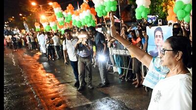 Kolkata, May 28 (ANI): West Bengal Chief Minister Mamata Banerjee greets people during a roadshow in support of Trinamool Congress (TMC) North Kolkata candidate, Sudip Banerjee for the Lok Sabha Polls, in Kolkata on Monday. (ANI Photo) (Utpal sarkar) Kolkata, May 28 (ANI): West Bengal Chief Minister Mamata Banerjee greets people during a roadshow in support of Trinamool Congress (TMC) North Kolkata candidate, Sudip Banerjee for the Lok Sabha Polls, in Kolkata on Monday. (ANI Photo) (Utpal sarkar)