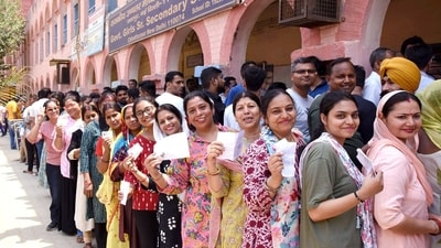 Voters display identity cards while standing in queue to cast their votes at a polling booth for the sixth phase of Lok Sabha elections on May 25. (ANI/PIB) Voters display identity cards while standing in queue to cast their votes at a polling booth for the sixth phase of Lok Sabha elections on May 25. (ANI/PIB)