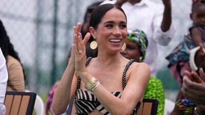 Meghan Markle watches her husband Prince Harry play in an exhibition sitting volleyball match, in Abuja, Nigeria, Saturday, May 11, 2024. Prince Harry and his wife Meghan are in Nigeria to champion the Invictus Games, which he founded to aid the rehabilitation of wounded and sick servicemembers and veterans. (AP Photo/Sunday Alamba) (AP) Meghan Markle watches her husband Prince Harry play in an exhibition sitting volleyball match, in Abuja, Nigeria, Saturday, May 11, 2024. Prince Harry and his wife Meghan are in Nigeria to champion the Invictus Games, which he founded to aid the rehabilitation of wounded and sick servicemembers and veterans. (AP Photo/Sunday Alamba) (AP)