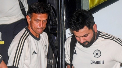 Indian cricket team coach Rahul Dravid (L) with captain Rohit Sharma before leaving for New York. (PTI) Indian cricket team coach Rahul Dravid (L) with captain Rohit Sharma before leaving for New York. (PTI)