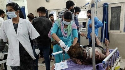 Burnt people being treated at a hospital after a fire broke out in the Kundli Industry area, in Sonipat. (PTI) Burnt people being treated at a hospital after a fire broke out in the Kundli Industry area, in Sonipat. (PTI)