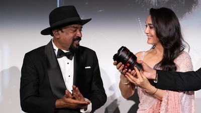 Preity Zinta with Santosh Sivan at Cannes Film Festival. Preity Zinta with Santosh Sivan at Cannes Film Festival.