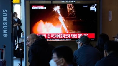 A news program broadcasts a file image of a rocket launch by North Korea, at the Seoul Railway Station in Seoul, South Korea, Tuesday, May 28, 2024. ( (AP Photo/Ahn Young-joon))