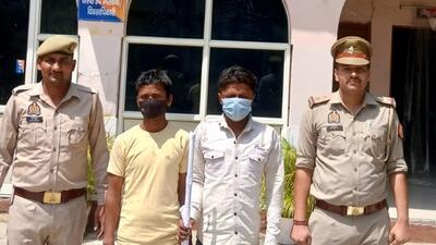 The two suspects, who are daily wagers engaged at a construction site, in police custody on Tuesday. (HT Photo) The two suspects, who are daily wagers engaged at a construction site, in police custody on Tuesday. (HT Photo)