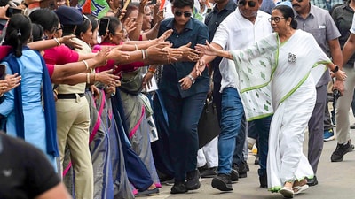 West Bengal Chief Minister and Trinamool Congress chief Mamata Banerjee during a road show in Kolkata, West Bengal. (PTI) West Bengal Chief Minister and Trinamool Congress chief Mamata Banerjee during a road show in Kolkata, West Bengal. (PTI)