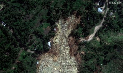 A satellite image shows buried homes after the landslide in Yambali village, Enga Province, Papua New Guinea, May 27, 2024. (Maxar Technologies via REUTERS)