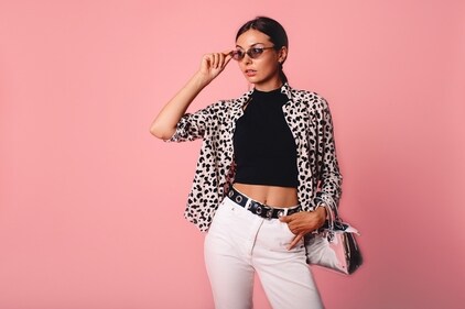 Drop some serious swag with a studded belt over your white jeans (Shutterstock) Drop some serious swag with a studded belt over your white jeans (Shutterstock)