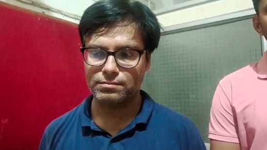 Dhaval Thakkar, the main accused in the Rajkot TRP game zone fire incident, after he was arrested by the Rajkot police and Banaskantha Local Crime Branch police from Abu Road in Rajasthan. (PTI)