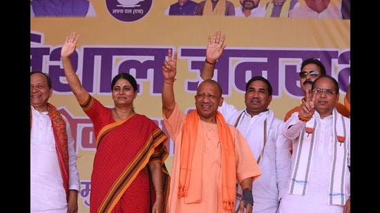UP CM Yogi Adityanath with Apna Dal (S) candidate from Mirzapur Anupriya Patel during a rally on Tuesday (HT)