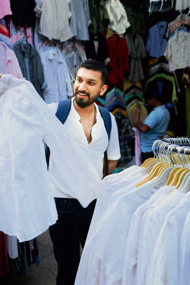 Software engineer Gautam Singh, who works in Noida, was spotted at Sarojini in quest for that perfect office shirt at shop 12.(Photo: Manoj Verma/HT) Software engineer Gautam Singh, who works in Noida, was spotted at Sarojini in quest for that perfect office shirt at shop 12.(Photo: Manoj Verma/HT)