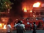 Firefighters attempt to douse the fire after it broke out at a New Born Baby Care Hospital in Vivek Vihar on May 25 (ANI)