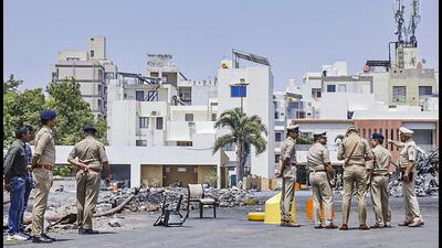 A police team visits the Rajkot game zone site on Tuesday where at least 28 people were killed in a fire on Saturday. (PTI) A police team visits the Rajkot game zone site on Tuesday where at least 28 people were killed in a fire on Saturday. (PTI)