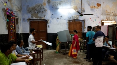 A scene from a polling station during the fifth phase of Lok Sabha polls in West Bengal’s Howrah district . (REUTERS) A scene from a polling station during the fifth phase of Lok Sabha polls in West Bengal’s Howrah district . (REUTERS)
