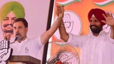 Congress leader Rahul Gandhi with party’s Ludhiana candidate Amarinder Singh Raja Warring during a rally in Mullanpur Dakha in Ludhiana on Wednesday. (Gurpreet Singh/HT)