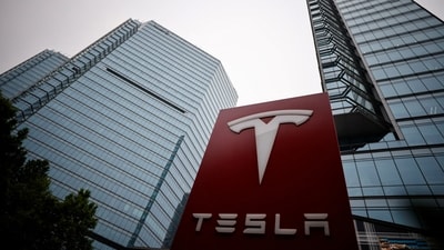 A Tesla logo seen outside a showroom of the carmaker in Beijing, China. (Reuters)