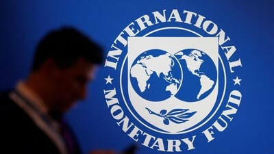 &nbsp;A participant stands near a logo of IMF at the International Monetary Fund - World Bank annual meeting &nbsp;in Nusa Dua, Bali, Indonesia. (Reuters)