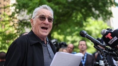 Robert De Niro heckled by pro-Trump protesters outside Manhattan courtroom, actor calls them gangsters (Photo by CHARLY TRIBALLEAU / AFP) (AFP) Robert De Niro heckled by pro-Trump protesters outside Manhattan courtroom, actor calls them gangsters (Photo by CHARLY TRIBALLEAU / AFP) (AFP)