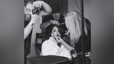 The black-and-white BTS pictures capture Aishwarya in the midst of her team's meticulous work as they create her red-carpet look for the 77th edition of the Cannes Film Festival. (Instagram) The black-and-white BTS pictures capture Aishwarya in the midst of her team's meticulous work as they create her red-carpet look for the 77th edition of the Cannes Film Festival. (Instagram)