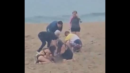 Video shows 3 American children being struck by lightning bolt on Puerto Rico beach (@CollinRugg/X)