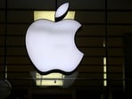 The Apple logo is illuminated at a store in the city center in Munich, Germany. The Apple logo is illuminated at a store in the city center in Munich, Germany.