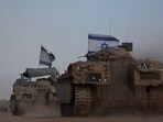Israeli armoured personnel carriers (APC) operate, amid the ongoing conflict between Israel and the Palestinian Islamist group Hamas, near Israel's border with Gaza in southern Israel
