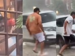 Rohit Sharma and Rahul Dravid sprint to a cab in the rain. Rohit Sharma and Rahul Dravid sprint to a cab in the rain.