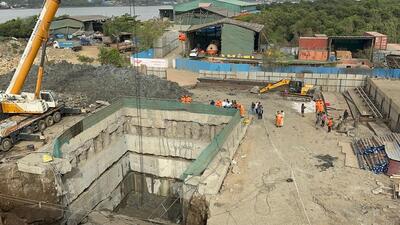 Excavator operator buried in debris as construction site caves in Palghar Excavator operator buried in debris as construction site caves in Palghar