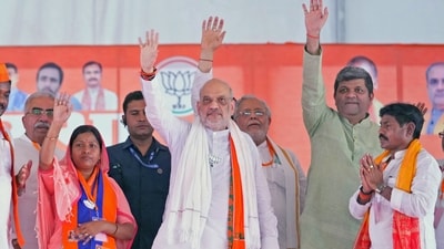 Union Home Minister Amit Shah greets people during a public meeting for the last phase of Lok Sabha polls, in Robertsganj on Wednesday. Union Home Minister Amit Shah greets people during a public meeting for the last phase of Lok Sabha polls, in Robertsganj on Wednesday.