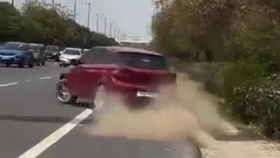 According to traffic police, the red Hyundai i-20 with tinted glasses was involved in dangerous driving on the expressway. (HT Photo) According to traffic police, the red Hyundai i-20 with tinted glasses was involved in dangerous driving on the expressway. (HT Photo)