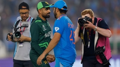 Pakistan's Babar Azam shakes hands with India's Rohit Sharma after India vs Pakistan match in Ahmedabad (REUTERS)