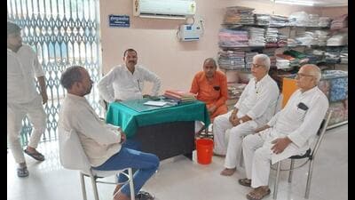 Harendra Nath Mishra and others discussing political scenario in Ballia. Mishra is manager of one of the oldest Gandhi ashram in the region (HT)