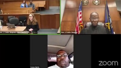 Michigan man with suspended license joins court Zoom call while driving (@CollinRugg/X) Michigan man with suspended license joins court Zoom call while driving (@CollinRugg/X)