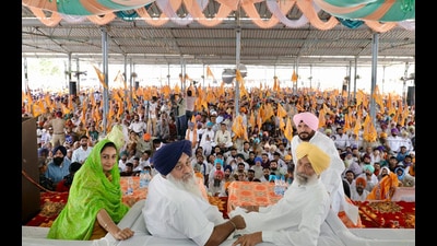 Shiromani Akali Dal president Sukhbir Singh Badal with party candidate Harsimrat Kaur Badal and other leaders during a rally in Sardulgarh on Thursday. (HT photo)