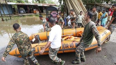 Soldiers carry out rescue operation in flooded areas of Tripura following the landfall of cyclone ‘Remal’. (PTI Photo)