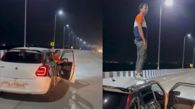 Mumbai: The image, taken from the viral video, shows the man coming out of the car and standing atop its roof. (X/@JhalawarPolice) Mumbai: The image, taken from the viral video, shows the man coming out of the car and standing atop its roof. (X/@JhalawarPolice)