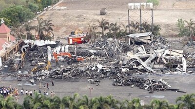 Debris being removed from the gaming zone site in Gujarat’s Rajkot, where a major fire broke out on May 25. (PTI) Debris being removed from the gaming zone site in Gujarat’s Rajkot, where a major fire broke out on May 25. (PTI)