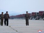 North Korean leader Kim Jong Un, second left, supervises firing drills at an undisclosed place in North Korea. North Korean leader Kim Jong Un, second left, supervises firing drills at an undisclosed place in North Korea.