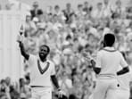 Viv Richards celebrates his century at Old Trafford with Michael Holding Viv Richards celebrates his century at Old Trafford with Michael Holding