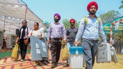 Polling officials leave for their polling stations with election materials inPatialia, Punjab. (PTI) Polling officials leave for their polling stations with election materials inPatialia, Punjab. (PTI)