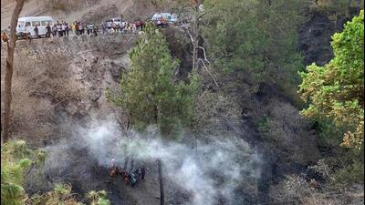 A day after 22 pilgrims were killed and 69 others injured in a bus accident in Jammu’s Akhnoor, six officials, including a motor vehicle inspector at the regional transport office in Kathua, were suspended on Friday. (AFP) A day after 22 pilgrims were killed and 69 others injured in a bus accident in Jammu’s Akhnoor, six officials, including a motor vehicle inspector at the regional transport office in Kathua, were suspended on Friday. (AFP)