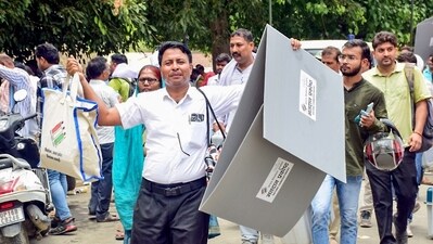 Uttar Pradesh, May 31 (ANI): A polling official carrying Electronic Voting Machines (EVMs) and other election-related materials leave for their respective polling booths for the 7th Phase of General Elections 2024, in Uttar Pradesh on Friday. (ANI Photo) (ECISVEEP-X) Uttar Pradesh, May 31 (ANI): A polling official carrying Electronic Voting Machines (EVMs) and other election-related materials leave for their respective polling booths for the 7th Phase of General Elections 2024, in Uttar Pradesh on Friday. (ANI Photo) (ECISVEEP-X)