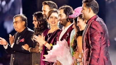Mukesh Ambani, Isha Ambani Piramal, Anand Piramal, Nita Ambani, Anant Ambani, Rihanna, Radhika Merchant, Shloka Mehta Ambani and Akash Ambani during pre-wedding celebrations of Anant and Radhika in Jamnagar, Gujarat. (Reuters)
